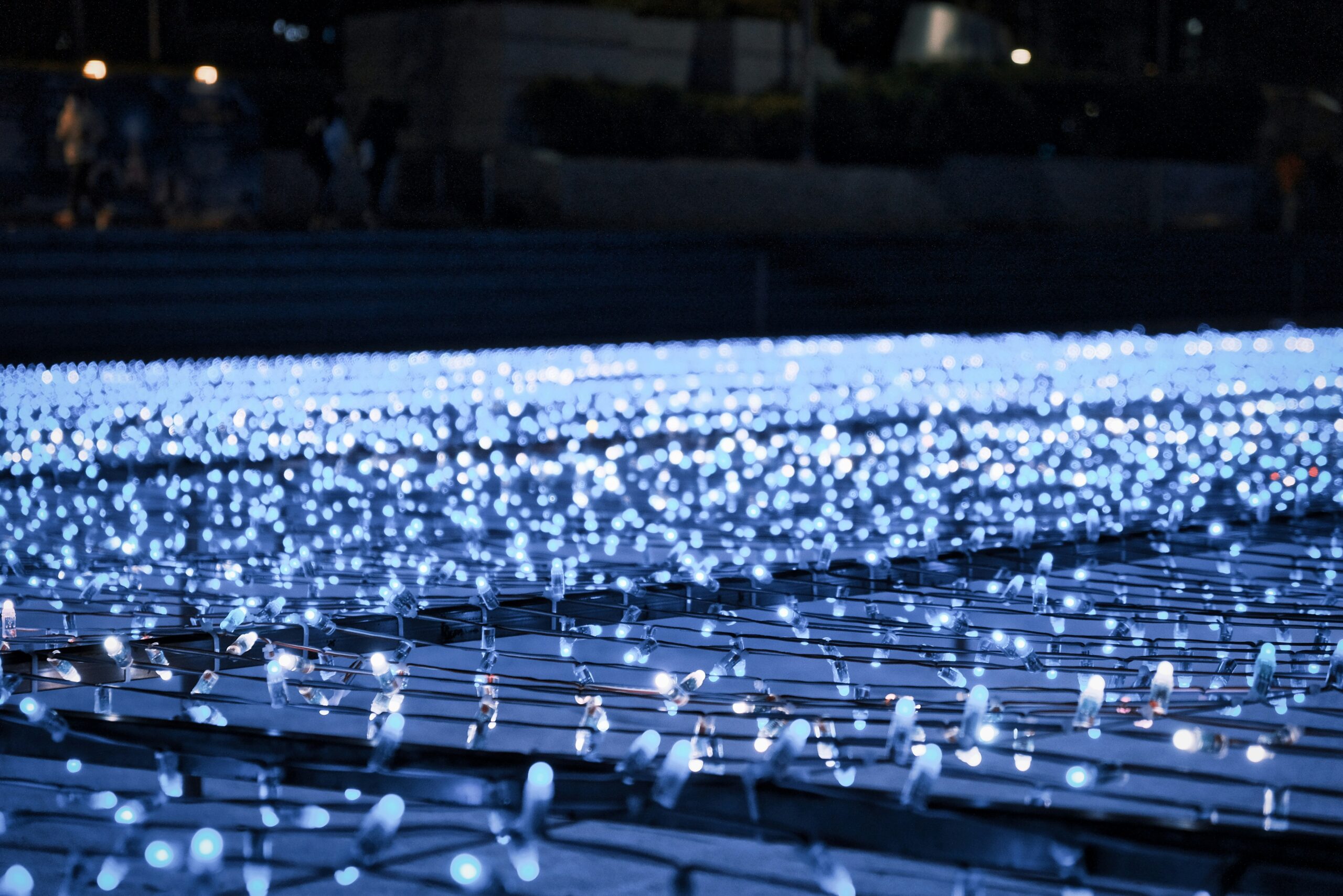 A Row Of Rows Of Rows Of Blue Lights